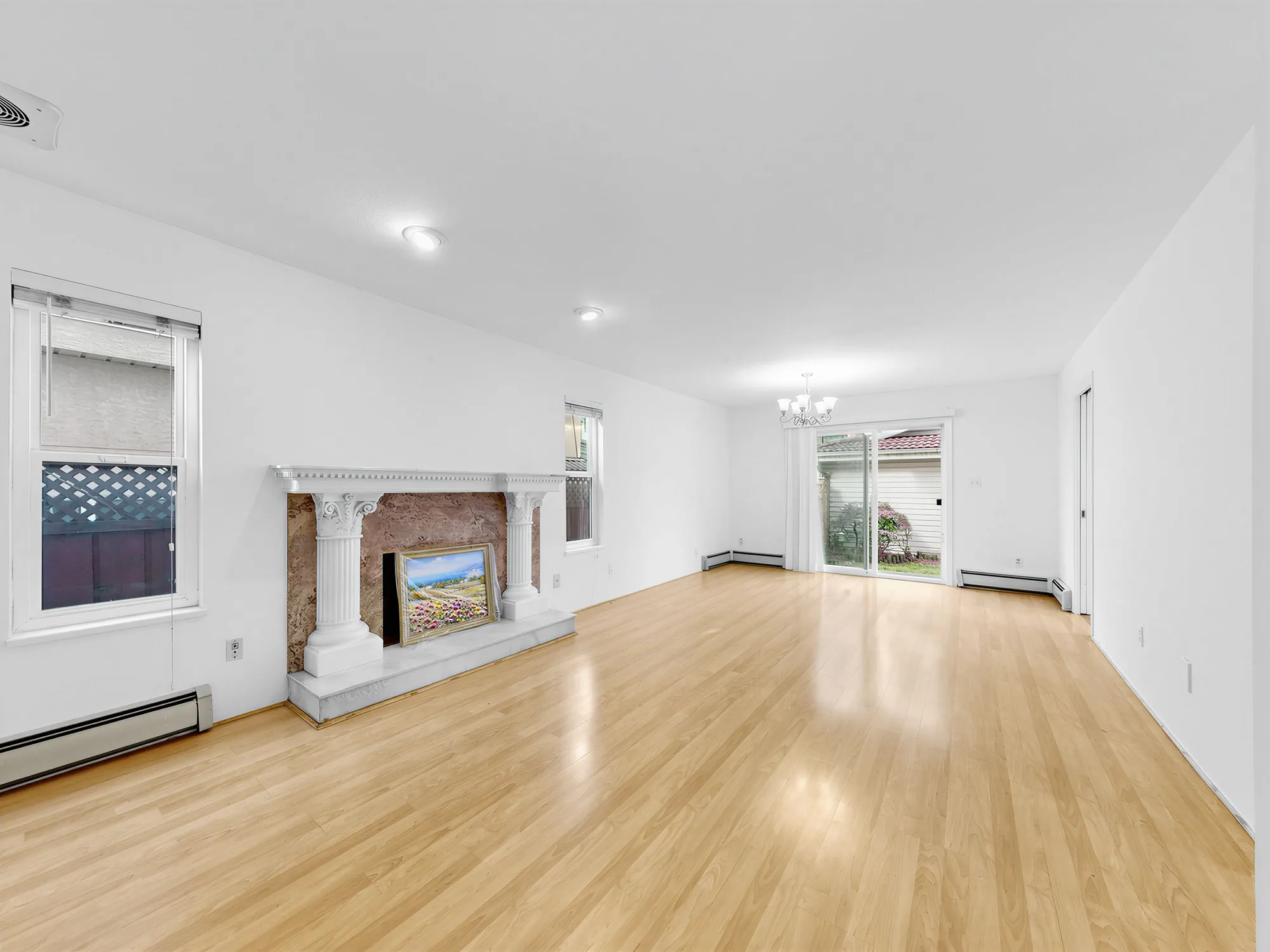 The living room from the far end, with windows to the garden